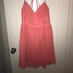 Knee length coral bridesmaids dress